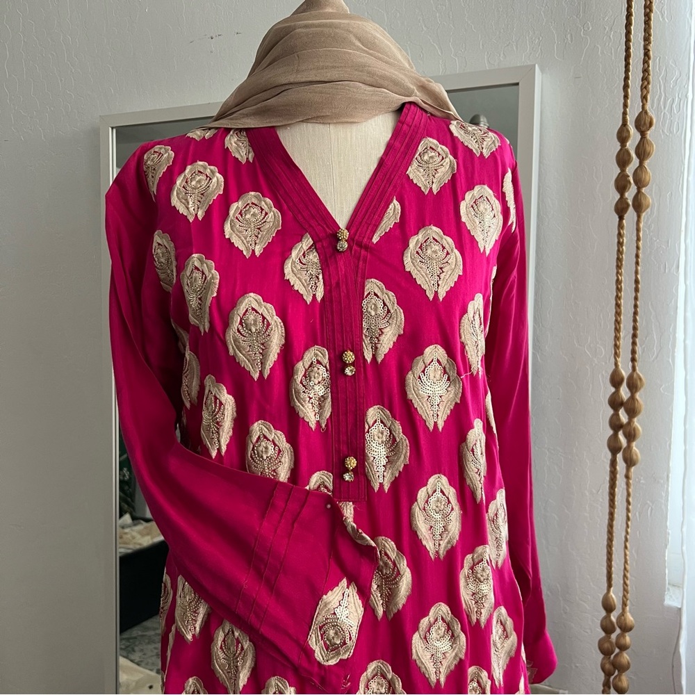 2 piece pink and gold suit